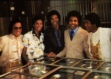 The Jacksons in a bank vault with gold records